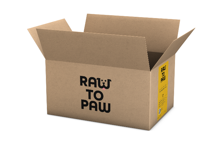 Cardboard box labeled 'Raw to Paw' showcasing quality pet food delivery.