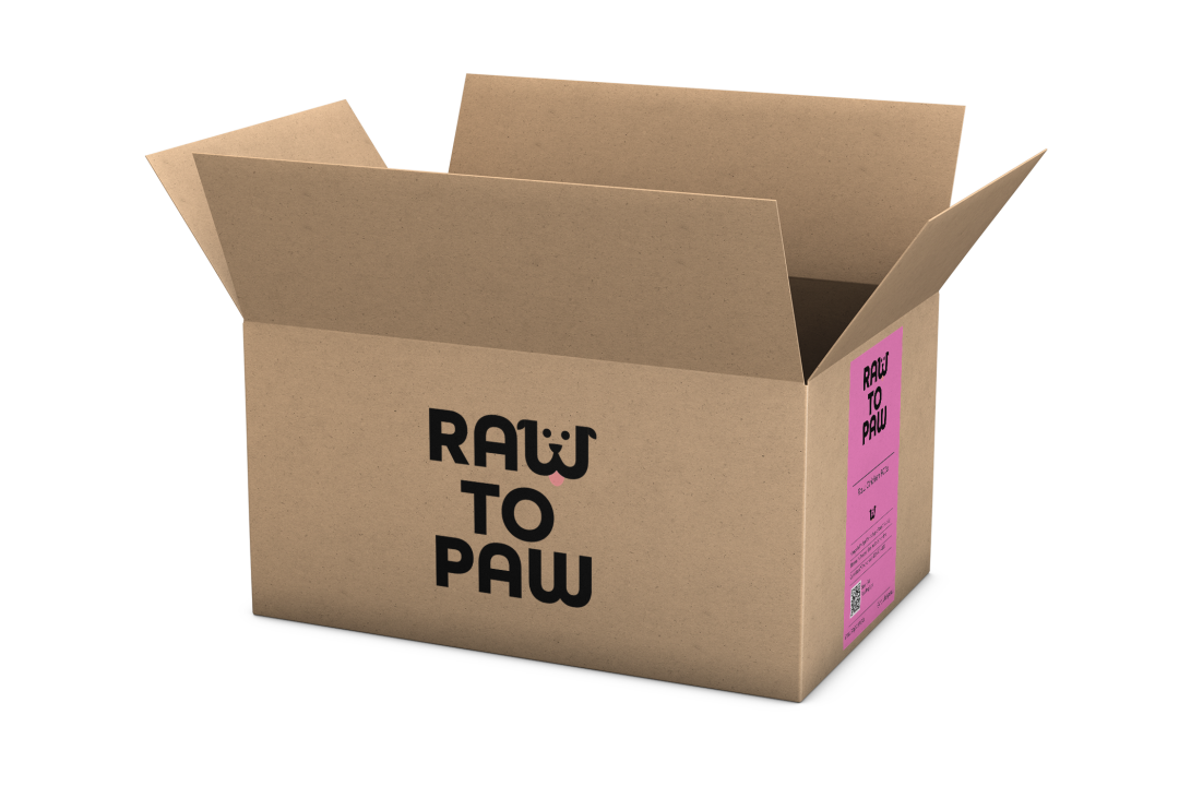 Open cardboard box for pet food delivery, featuring 'Raw to Paw' branding, emphasizing fresh ingredients.