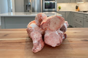 Fresh frozen raw beef bones, including marrow and knuckle, perfect for pets' dental health and bone broth.