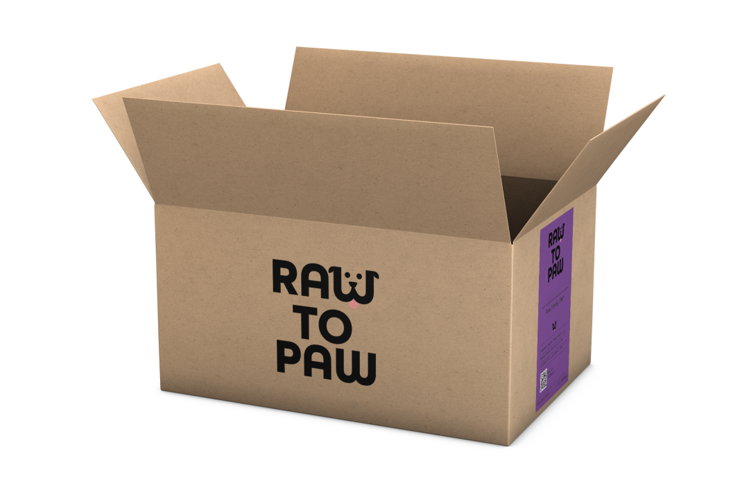 Cardboard box labeled 'RAW TO PAW' for delivering premium pet food directly to your door.