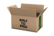 Eco-friendly raw pet food box labeled 'Raw to Paw' for home delivery of high-quality ingredients.