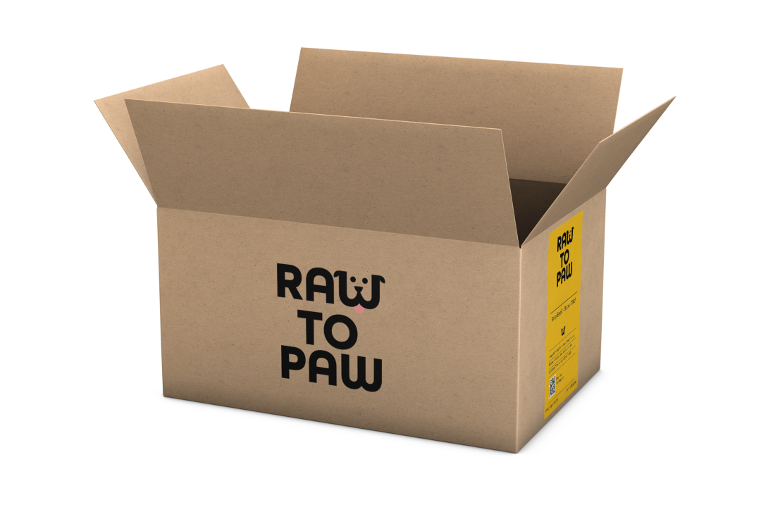 Eco-friendly delivery box for Raw to Paw pet food, showcasing quality ingredients for pet nutrition.